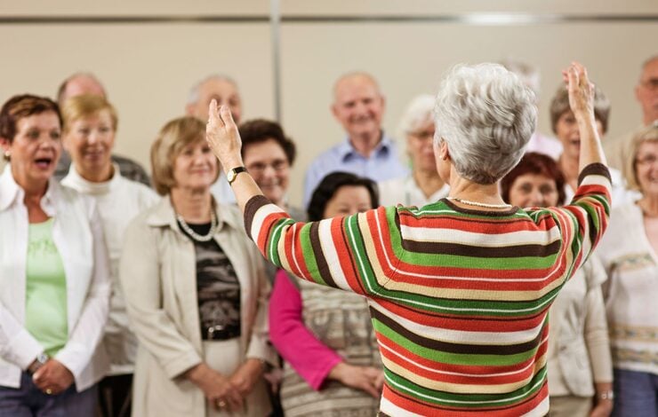 a person conducting a choir