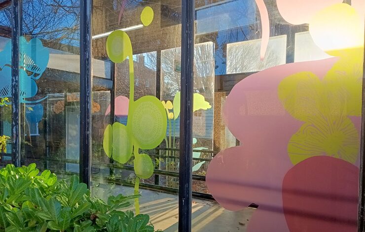 Sharon Quigley's vinyl designs on the glass corridor at the Royal Edinburgh Hospital