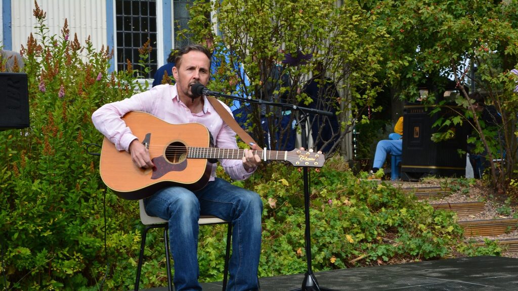 Charlie Gorman, musician and guitarist, playing guitar