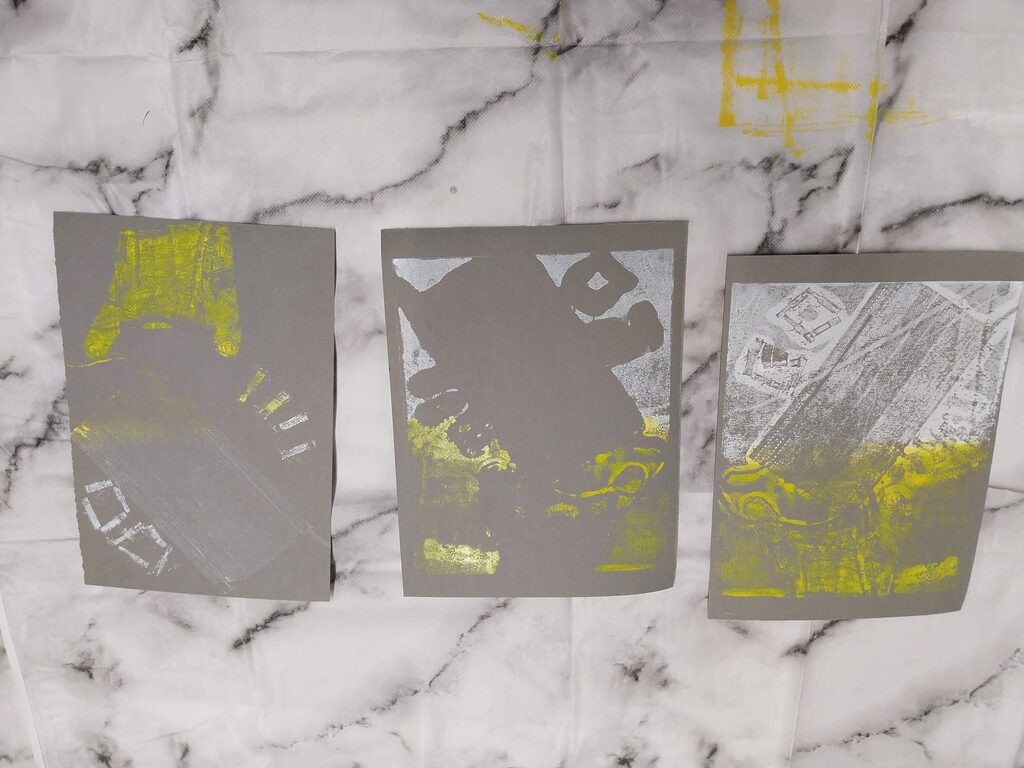 Abstract artwork in yellow and grey