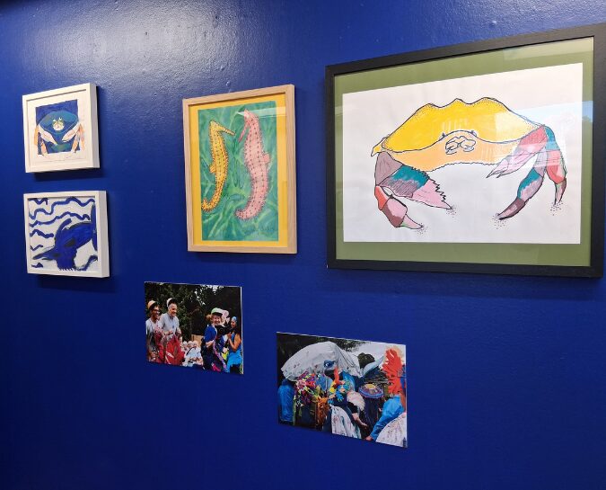 Artwork on blue wall