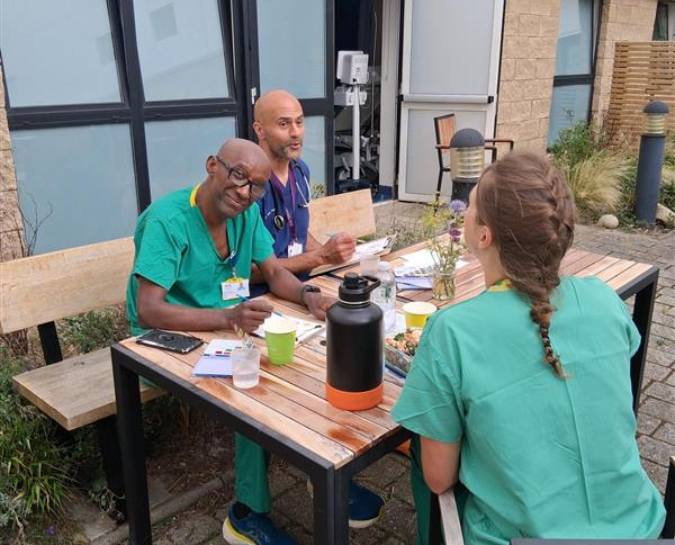 staff outside painting